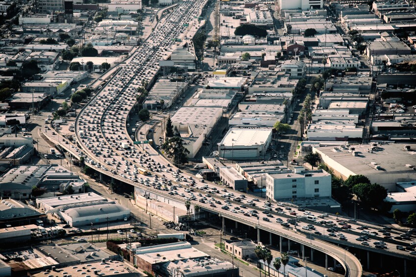 Heavy traffic during rush hour on Interstate 10 near downtown Los Angeles California during late afternoon. 