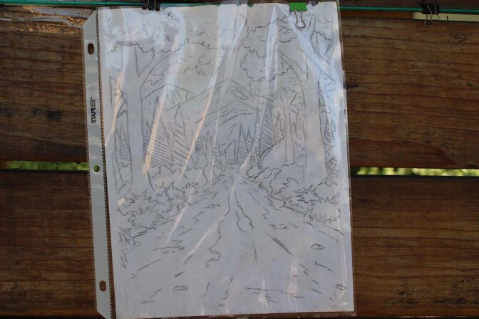 A drawing of a forest hangs on Dan Fields’ Los Feliz fence gallery.