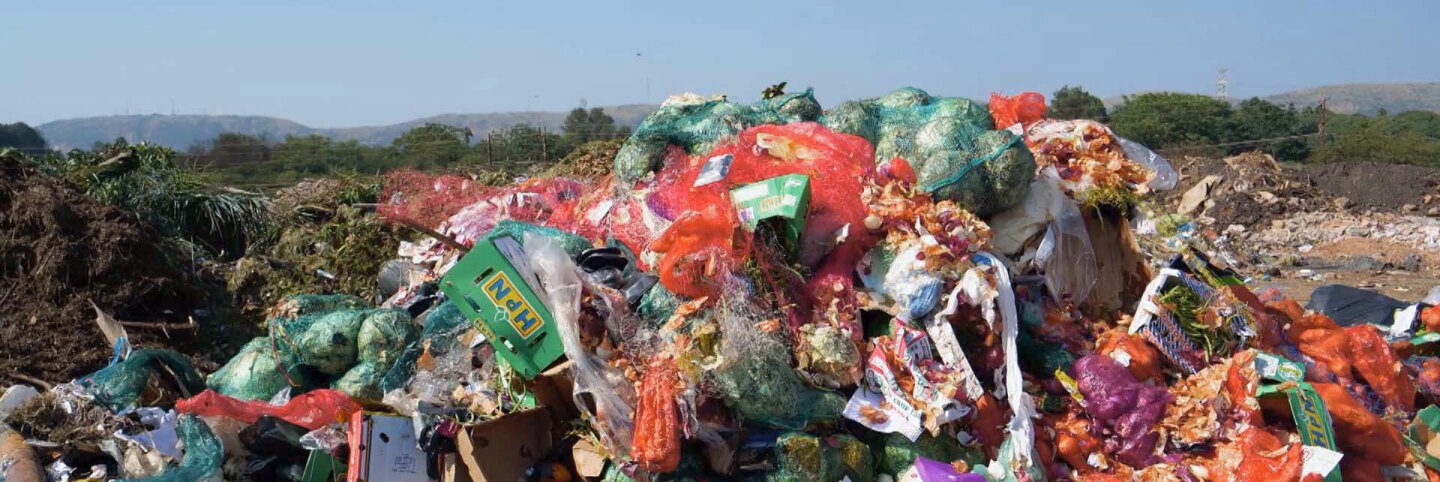 A mountain of food waste in a landfill. | Still from "Broken Bread"