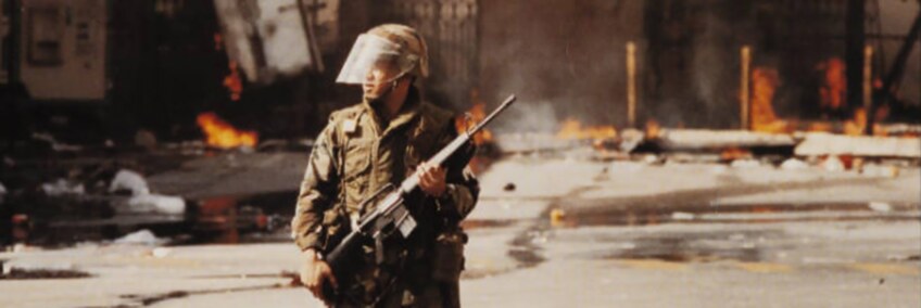 "Understanding the Riots," a Los Angeles Times publication containing photographs, testimonies, and descriptions of events before, during, and after the Rodney King riots, cover, 1992. | Los Angeles Webster Commission records, 1931-1992, USC Libraries