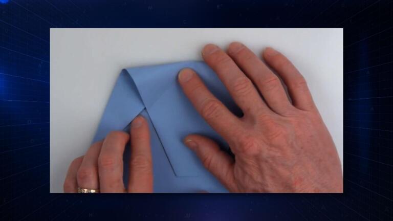 John Collins on his world record  paper airplane