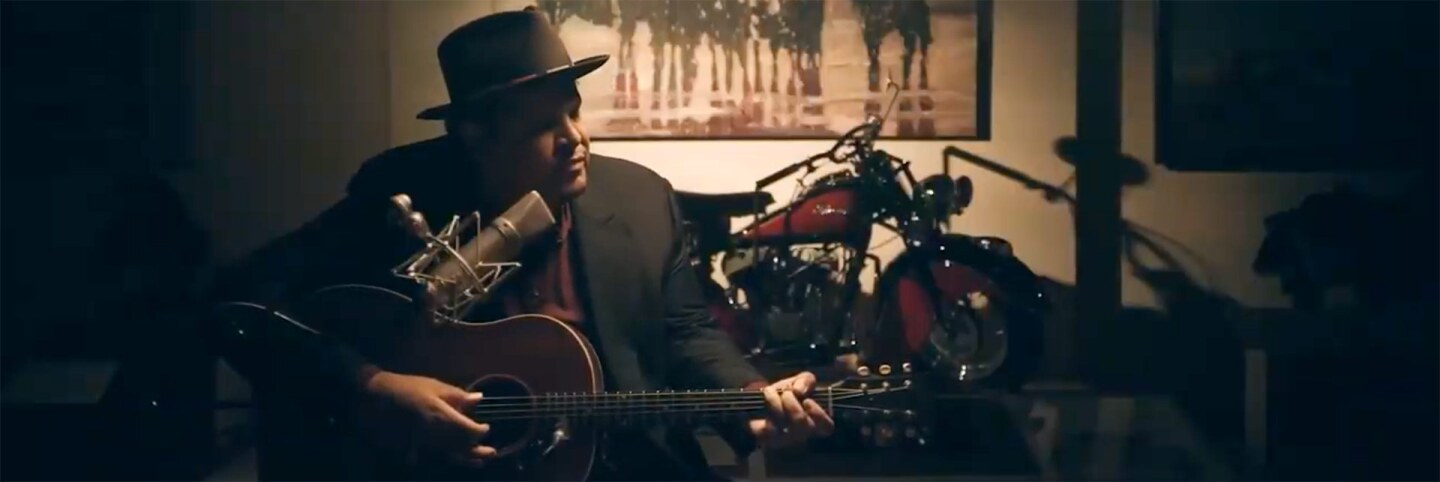 Chris Pierce plays his guitar at The Autry. | Still from "Chris Pierce - The Autry Presents: The Best of Los Angeles"