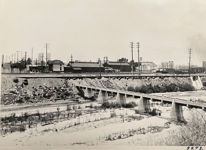 View of the future site of the Sixth Street Viaduct looking west over the river, June 17, 1929.