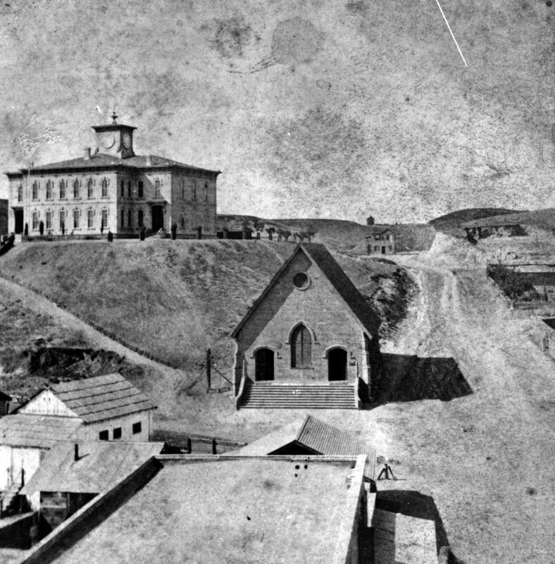A series of bald, treeless hills separated by gullies once dominated downtown Los Angeles' western horizon. Here, Los Angeles High School towers over its surroundings atop Poundcake Hill. Courtesy of the Photo Collection - Los Angeles Public Library.