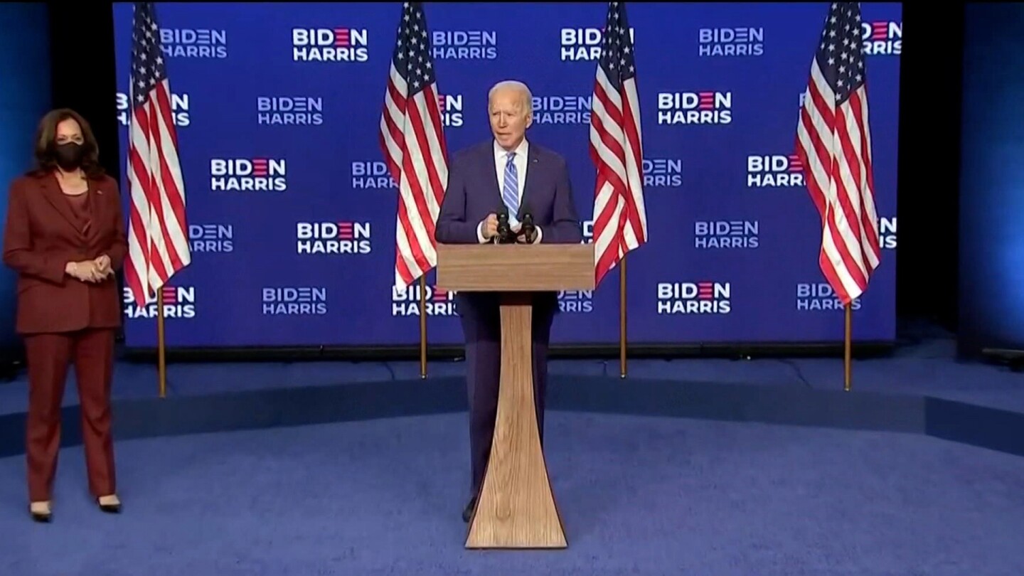 Joe Biden comments on election progress with Kamala Harris off to the side on November 4, 2020.