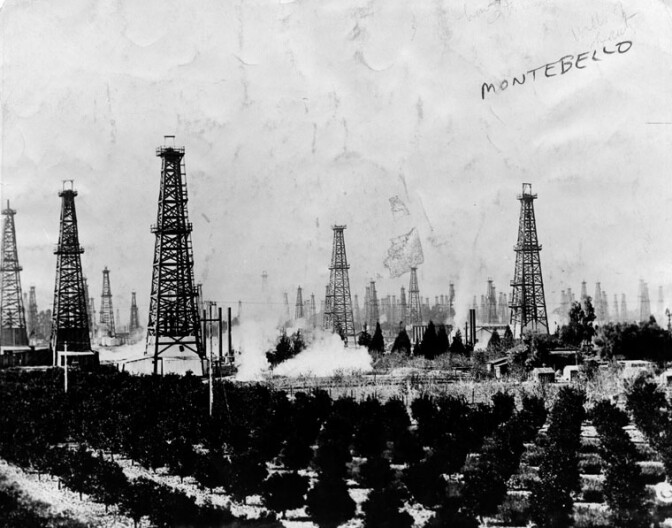 Two big Southland industries, citriculture and oil extraction, meet in Montebello, 1926. Courtesy of the Herald-Examiner Collection - Los Angeles Public Library.
