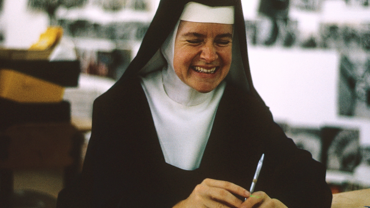 A nun smiling