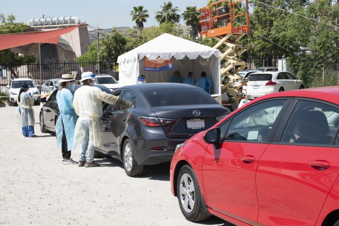 Health workers at a COVID-19 testing site in Boyle Heights. | Courtesy of Altamed