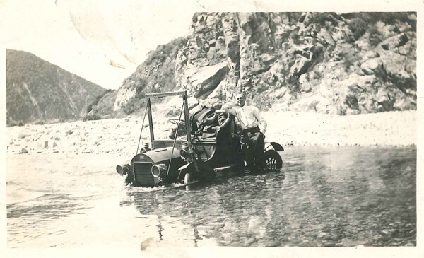 Henry O'Melveny was an advocate for better roads along the San Gabriel Canyon. Although the river got the better of the automobile in this circa 1915 photo, graded roads were part of the canyon landscape before 1930 | Courtesy of John G. Tomlinson, Jr.