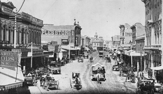Horse-drawn buggies, carts, wagons, and streetcars move down Spring Street in this circa 1884 view. Courtesy of the USC Libraries - California Historical Society Collection.