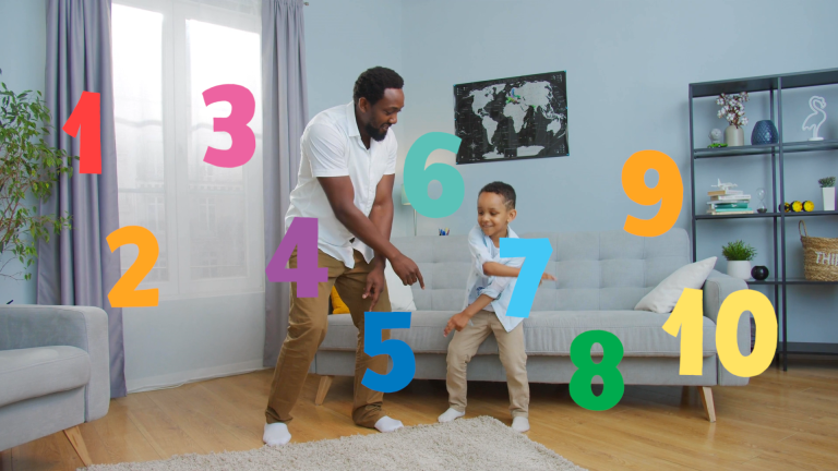 A father and small child dance in a living room as animated numbers 1-10 swirl around them.