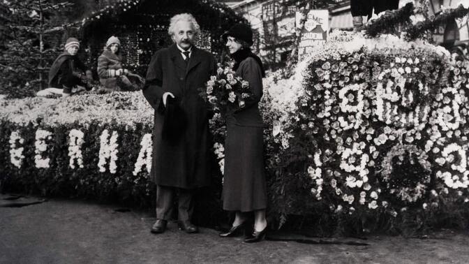 Dr. Albert Einstein took time out from his research to inspect the prize winning float in the 1932 Rose Parade. The float represented a scene in the Black Forest of Germany. | Photo Getty Images / Bettman