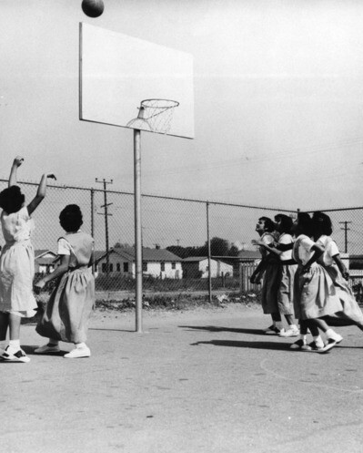 Girls' basketball game at Holy Family School at Holy Family Catholic Church in Wilmington, circa 1952 | Shades of L.A. Collection, Los Angeles Public Library