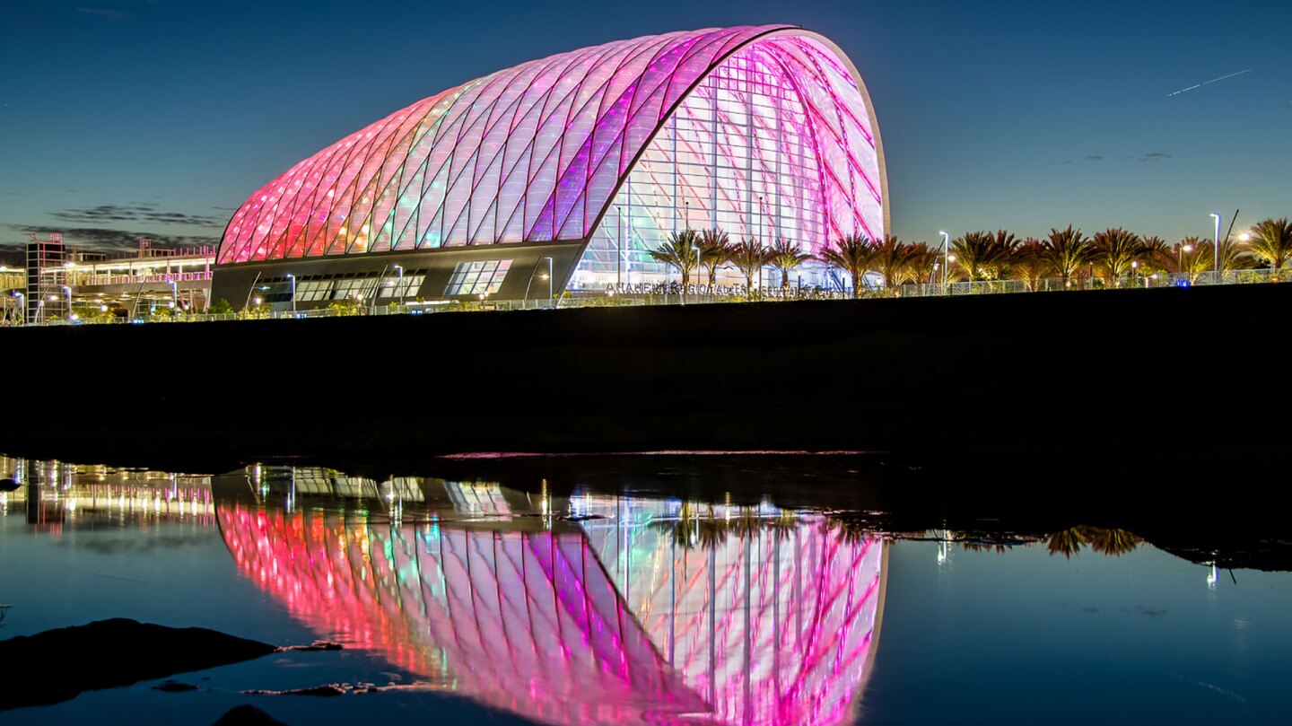 Outdoor evening shot of the Anaheim Regional Transportation Intermodal Center overlooking the Santa Ana River.