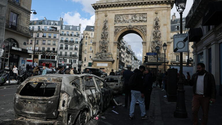 French authorities impose curfews after weekend rioting