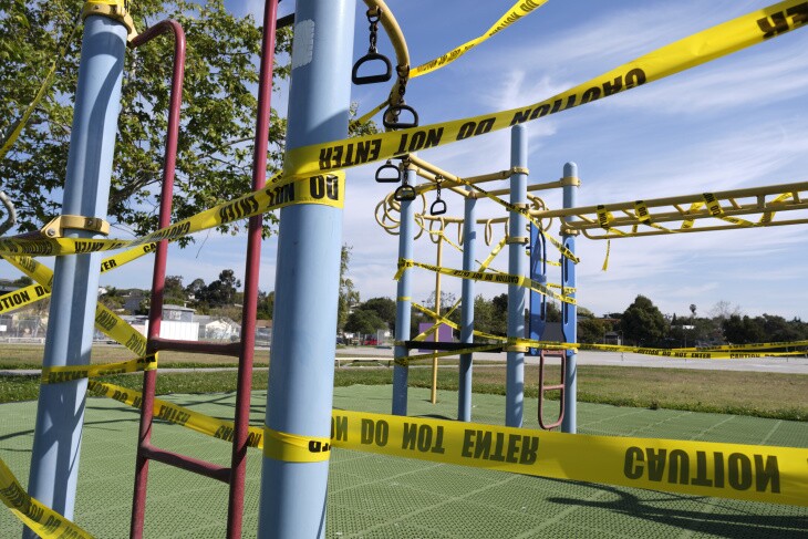 Staff have wrapped a playground structure at Walgrove Avenue Elementary in caution tape.