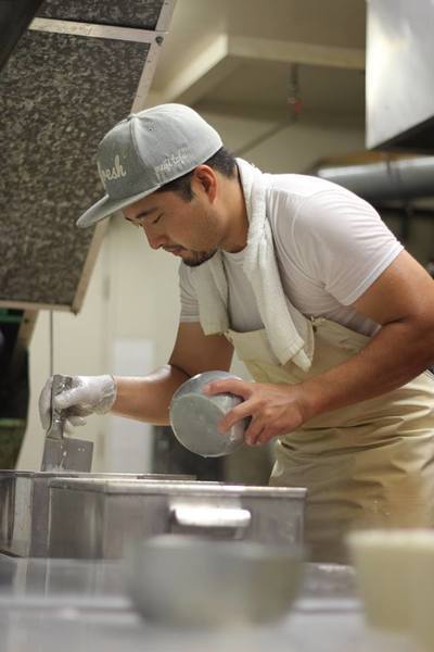 Meiji Tofu owner Koki Sato making tofu | Courtesy of Meiji Tofu