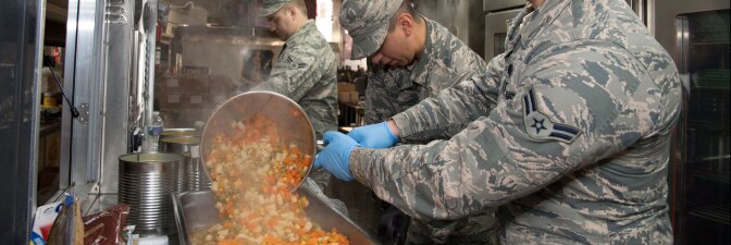 U.S. Air Force Airman 1st Class Alexander O’Reilly, from the 116th Air Control Wing (ACW) Services Flight, Georgia Air National Guard (ANG), prepares vegetables for dinner | Wikimedia Commons