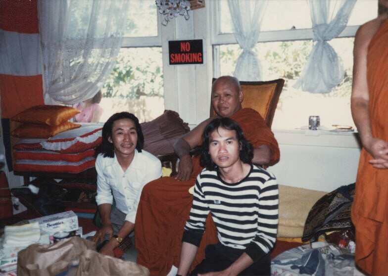 Laotian Americans inside the residence of a monk in 1981. Possibly located in Oakland, CA. | UC Irvine/Southeast Asian Archive