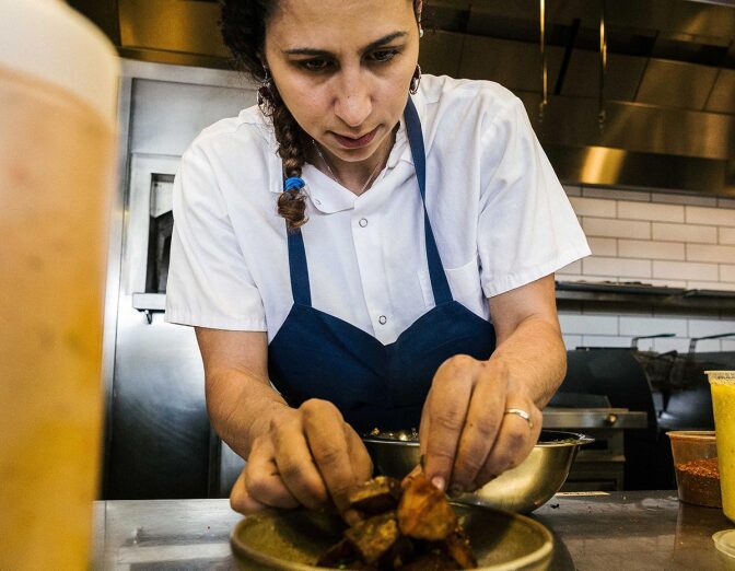 Reem Assil preparing a dish | Jim Sullivan