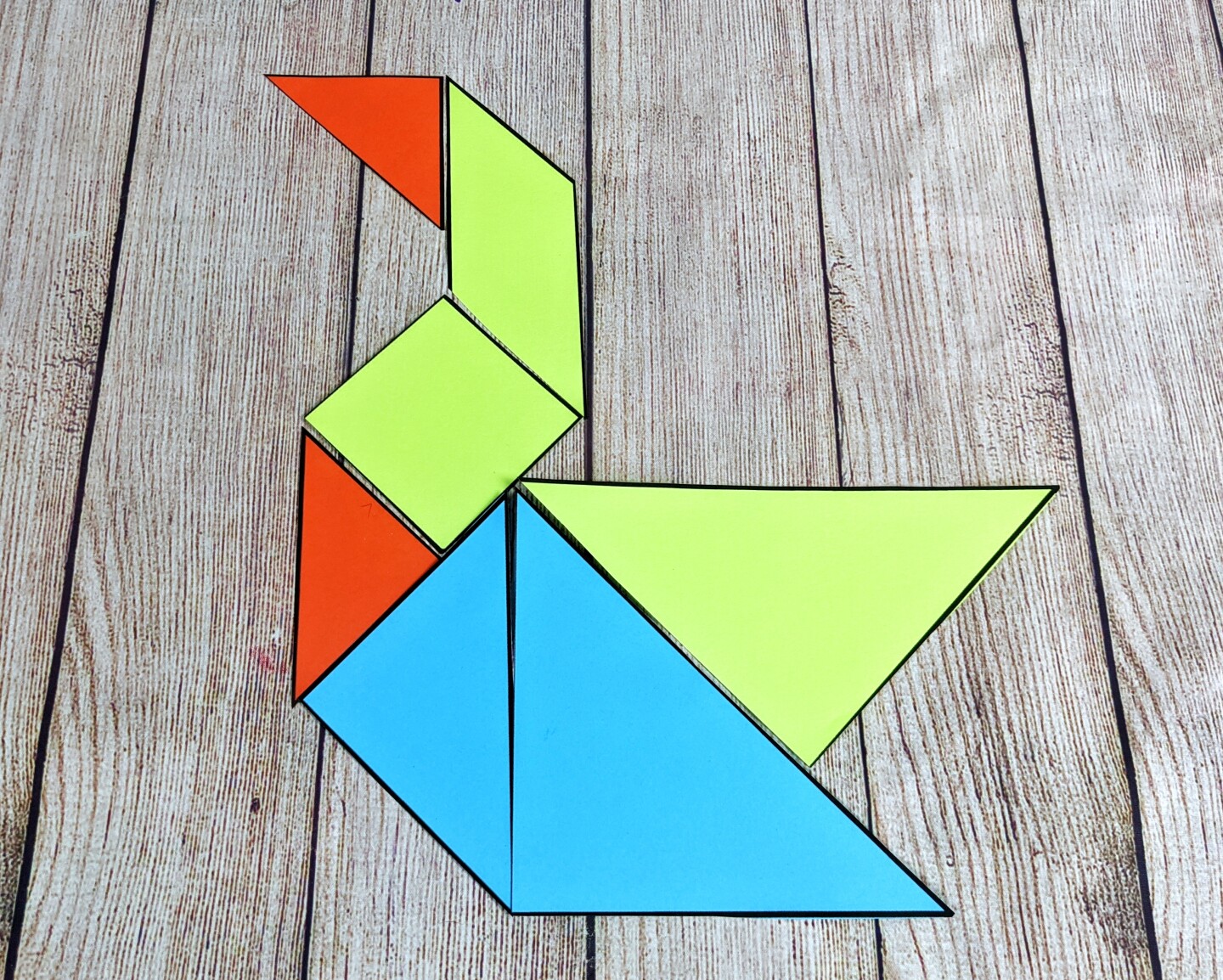 Tangram shapes arranged in the shape of a duck