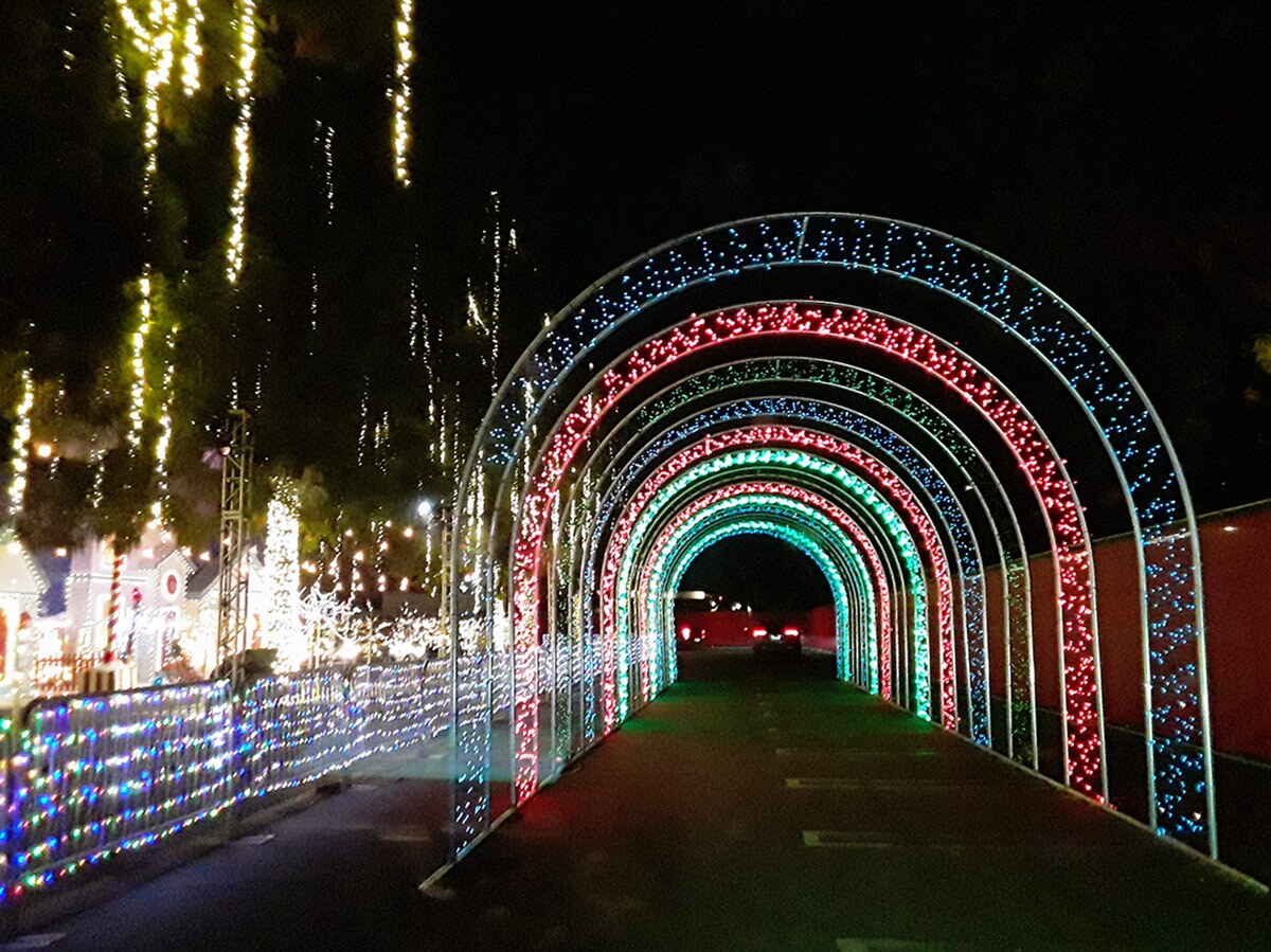 A tunnel of red and green lights at WonderLAnd at Westfield Topanga & The Village. | Sandi Hemmerlein