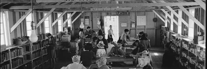 San Bruno, California. A barrack building at this assembly center has been reserved for the library which has just been established with a trained librarian of Japanese ancestry in charge.| US National Archives and Records Administration
