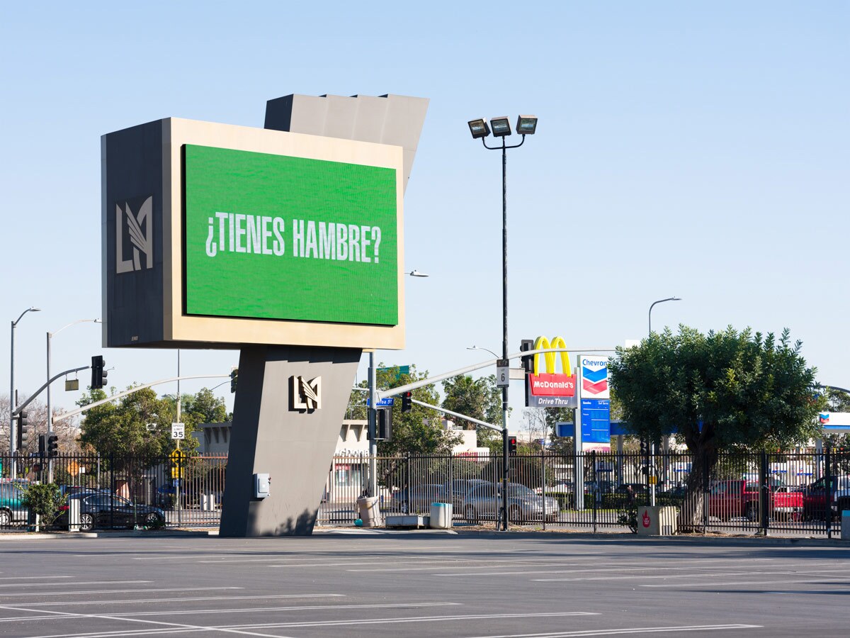 Barbara Kruger asks "Tienes hambre?" on a digital billboard at the Banc of California Stadium as part of "Untitled (Questions)" | Fredrik Nielsen, courtesy of the artist and Frieze