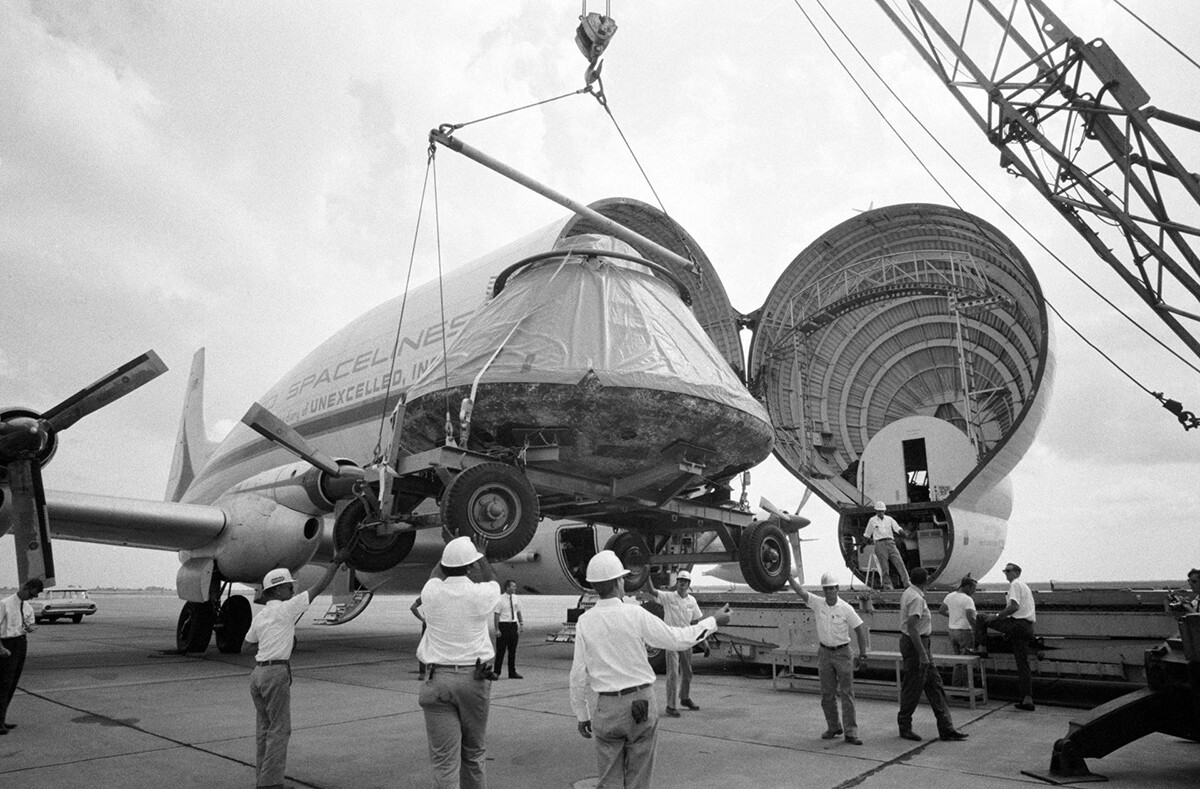 The Apollo 11 spacecraft Command Module (CM) is loaded aboard a Super Guppy Aircraft at Ellington Air Force Base for shipment to the North American Rockwell Corporation in Downey. | Courtesy of NASA
