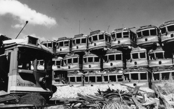Old Pacific Electric cars piled up in Wilmington in April 1959 | Security Pacific National Bank Collection, Los Angeles Public Library