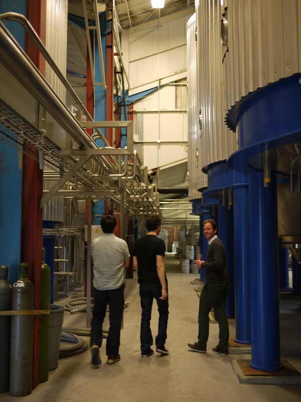 On tour of the massive space of the brewery with several beer fermentation tanks | Photo by George Villanueva
