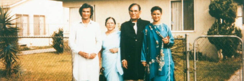 Syed and Qaiser with their children Qamar and Faozia in front of a home in Los Angeles. | Shades of L.A. Collection / LAPL