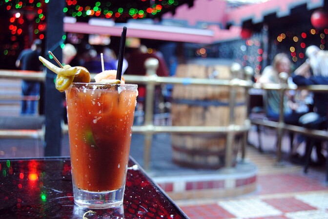 Drink with bar in background.