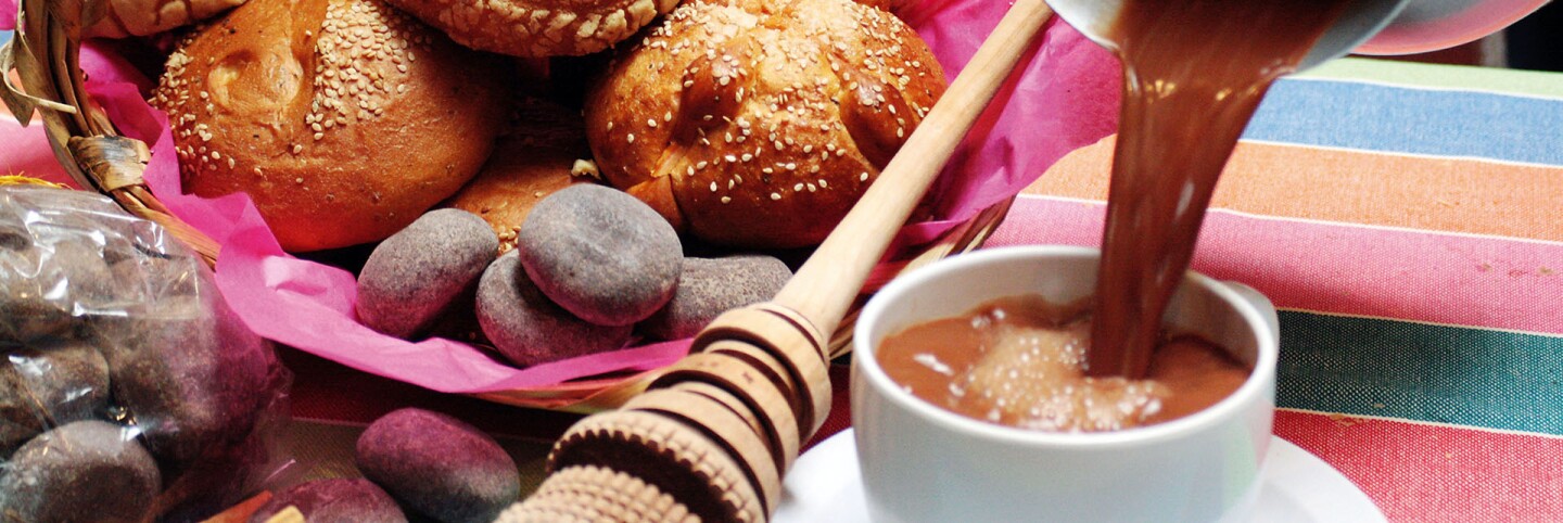 Drinking chocolate and pan dulce at Guelaguetza | Courtesy of Guelaguetza