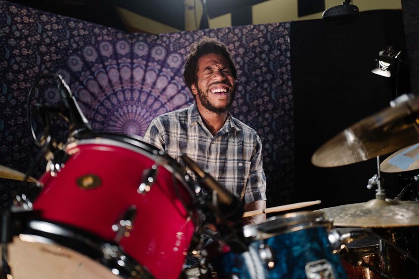 Mekala Session, leader of the Pan Afrikan Peoples Arkestra, playing drums | Samantha Lee ab s11