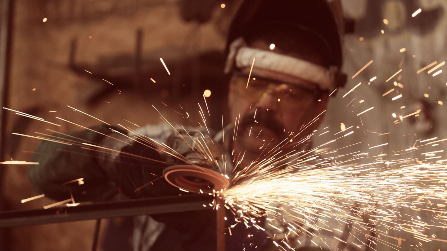 A Worker At Cisco Pinedo's Furniture Business