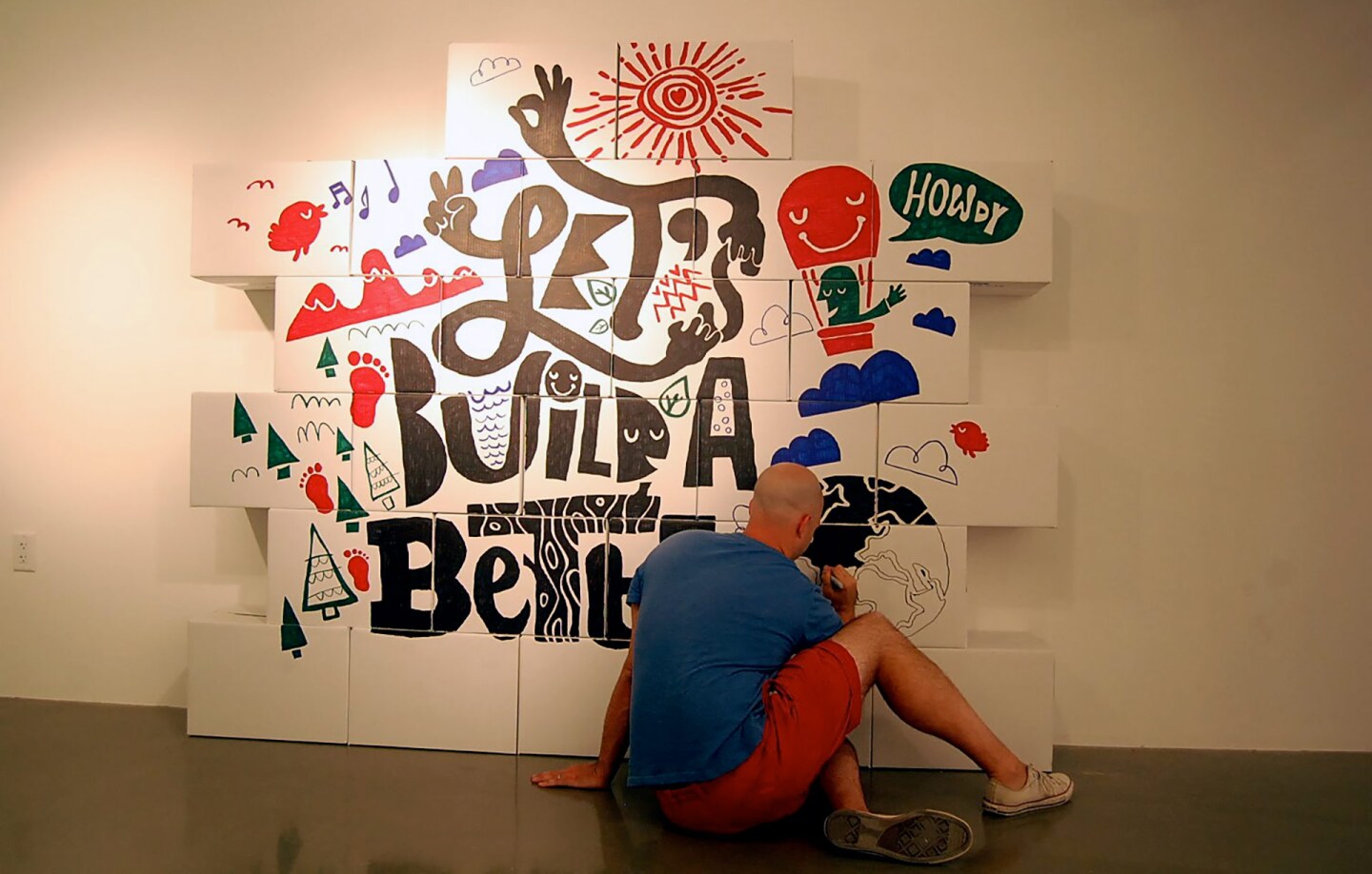 Brian Gossett works on his contribution for “Come In! A Spatial Intervention” at the A+D Museum. | Carren Jao