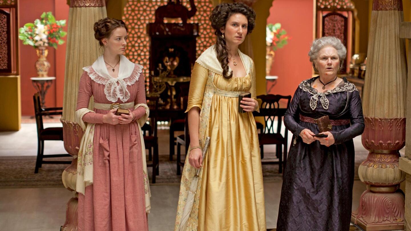 Margaret Osborne (Dakota Blue Richards), Violet Woodhouse (Bessie Carter) and Henrietta Beecham (Lesley Nicol) standing inside a grand home. | "Beecham House on Masterpiece: Episode 2"