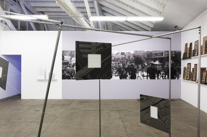 An installation view of "(Dis)Location," an installation featuring works from artists Beatriz Jaramillo, Elana Mann and Britt Ransom. The piece in the foreground is part of Jaramillo's "In Between: Los Angeles Wetlands," — an art piece that explores the contradiction between continual urban expansion and nurturing L.A's wetlands.