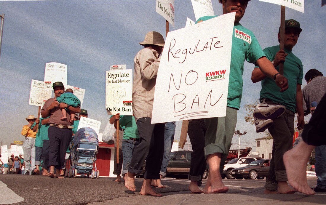The Assn. of Latin American Gardeners of Los Angeles march along Beverly Blvd. Tuesday on their way to Los Angeles City Hall to protest the city ordinance prohibiting the use of gaspowered leaf blowers. | Ken Lubas/Getty Images