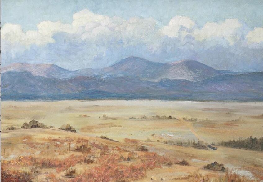 A landscape painting of a desert scene with mountains beyond.