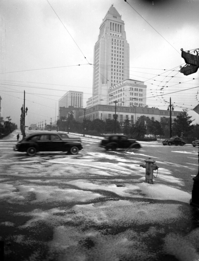 Los Angeles City Hall towers over slushy streets on Feb. 21, 1944
