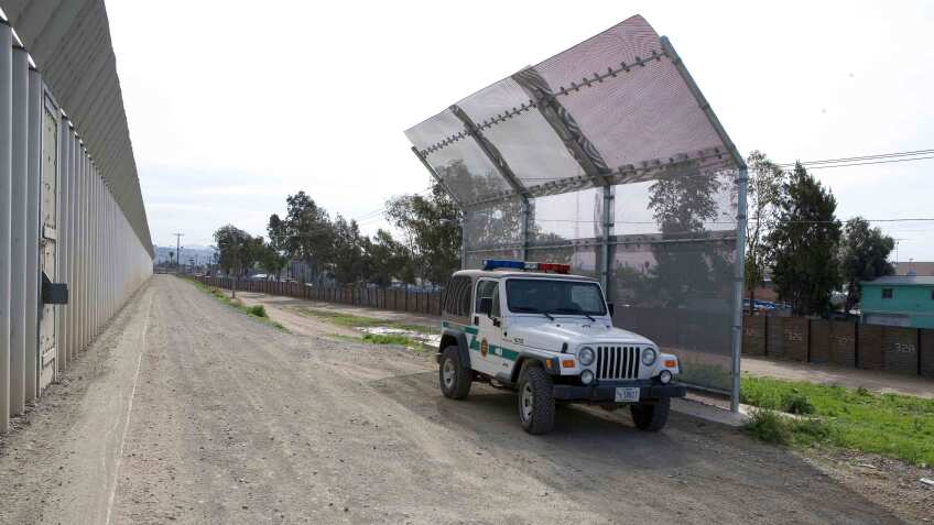 Some areas of the border are secured with double-fencing