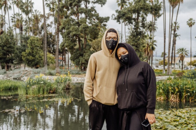 Jeremy H. and Tanasia M. rarely go out even for walks, and when they do they keep to themselves, and rarely talk to anyone. | Chava Sanchez/LAist