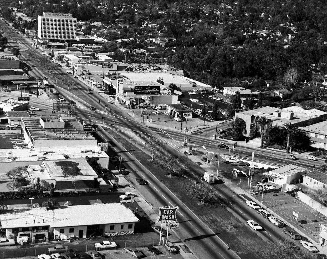 The landscaped median of San Vicente Boulevard, seen here circa 1970 at Montana Avenue in Brentwood, once carried the Pacific Electric's Westgate Line. Courtesy of the USC Libraries - California Historical Society Collection.