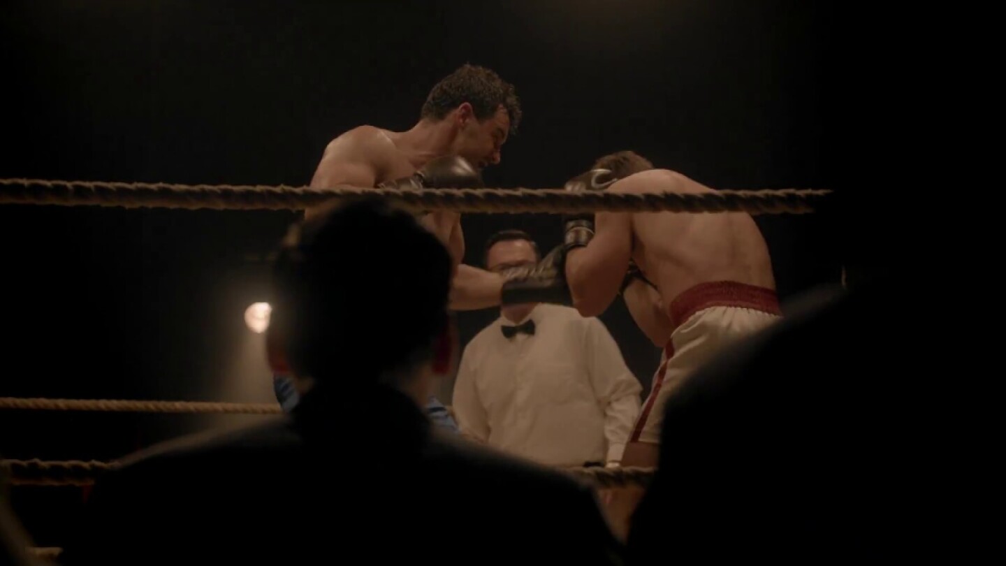 Scene from The Doctor Blake Mysteries: 2 men boxing in ring.