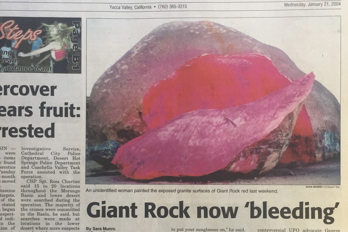 On January 21, 2004, the Hi-Desert Star reported that an unidentified woman spray painted the boulder's exposed surfaces bright red as an "artistic" intervention "expressing the rock’s pain." | Sara Munro for Hi-Desert Star
