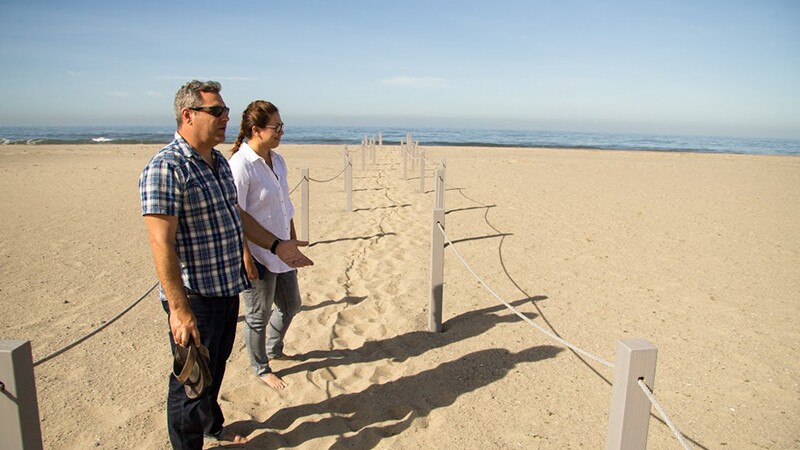 Tom Ford and Melodie Grubbs at the restoration site | Photo: Jason Goldman