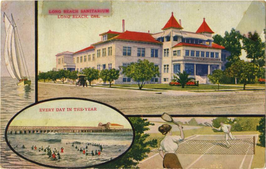 An illustrated/watercolor postcard of the Long Beach Sanitarium. The postcard is comprised of a painting of the sanitarium, a white two-story building with red roofs and surrounded by plants and trees. Beneath that painting is a narrow panel featuring an illustration of two people playing tennis on a tennis court. Another narrow panel to the left features a painting of a sailboat in the water. And an oval features a painting of the ocean and a dock with the words, "Every Day in the Year" written in red across it.