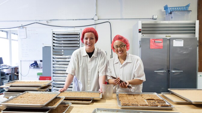 Claire Keane, Owner of Clairesquares in her production facility | Sarah Peet Photography